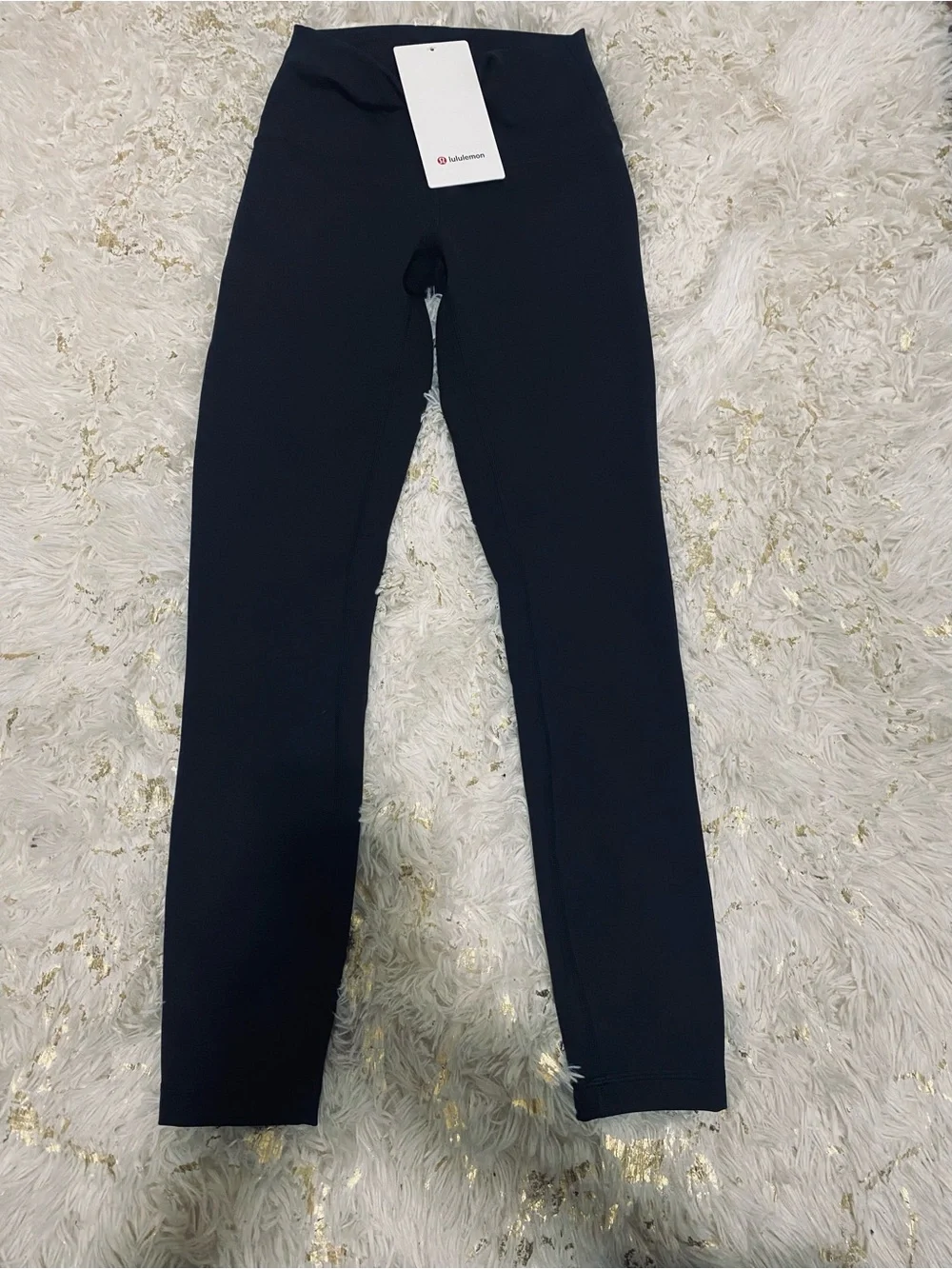 lululemon athletica Black Wunder Train High-Rise Tight 25". Size. 4 - Picture 11 of 14